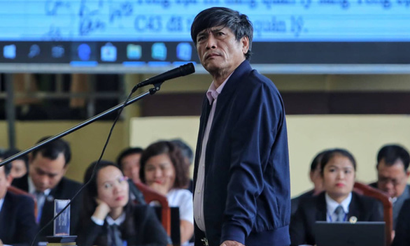 Ông Nguyễn Thanh Hóa khi ra hầu tòa.