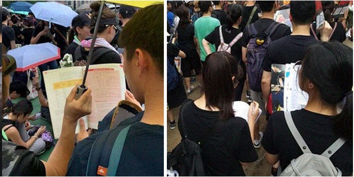 Sinh viên Hồng Kông tranh thủ đọc sách trong khi biểu tình. (Ảnh qua Izismile.c)