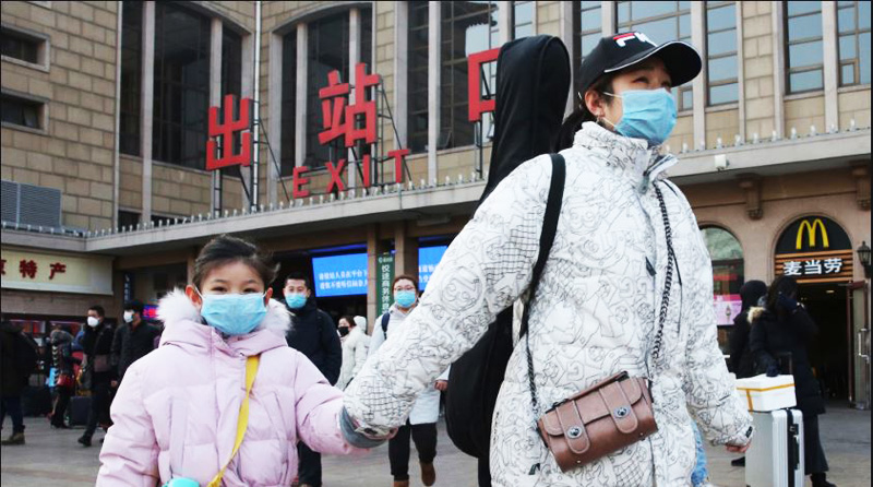 Người dân Trung Quốc đeo khẩu trang phòng chống dịch virus Corona
